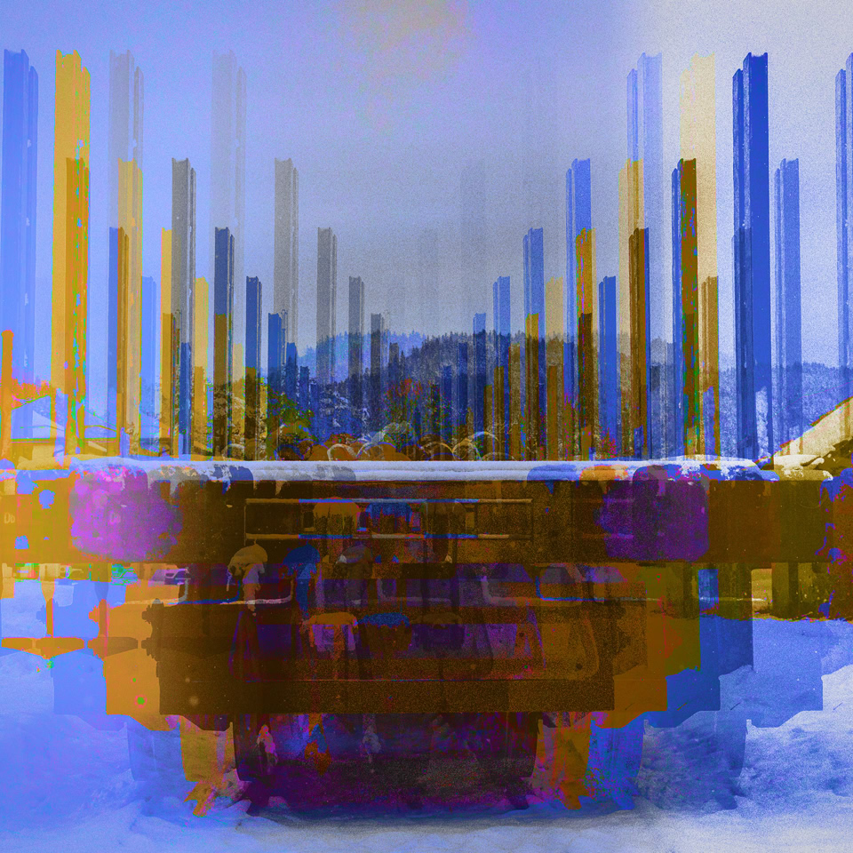 A digitally altered image with vertical blue and yellow lines over a snowy landscape, featuring trees and mountains in the background.